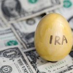 IRA egg on top of money